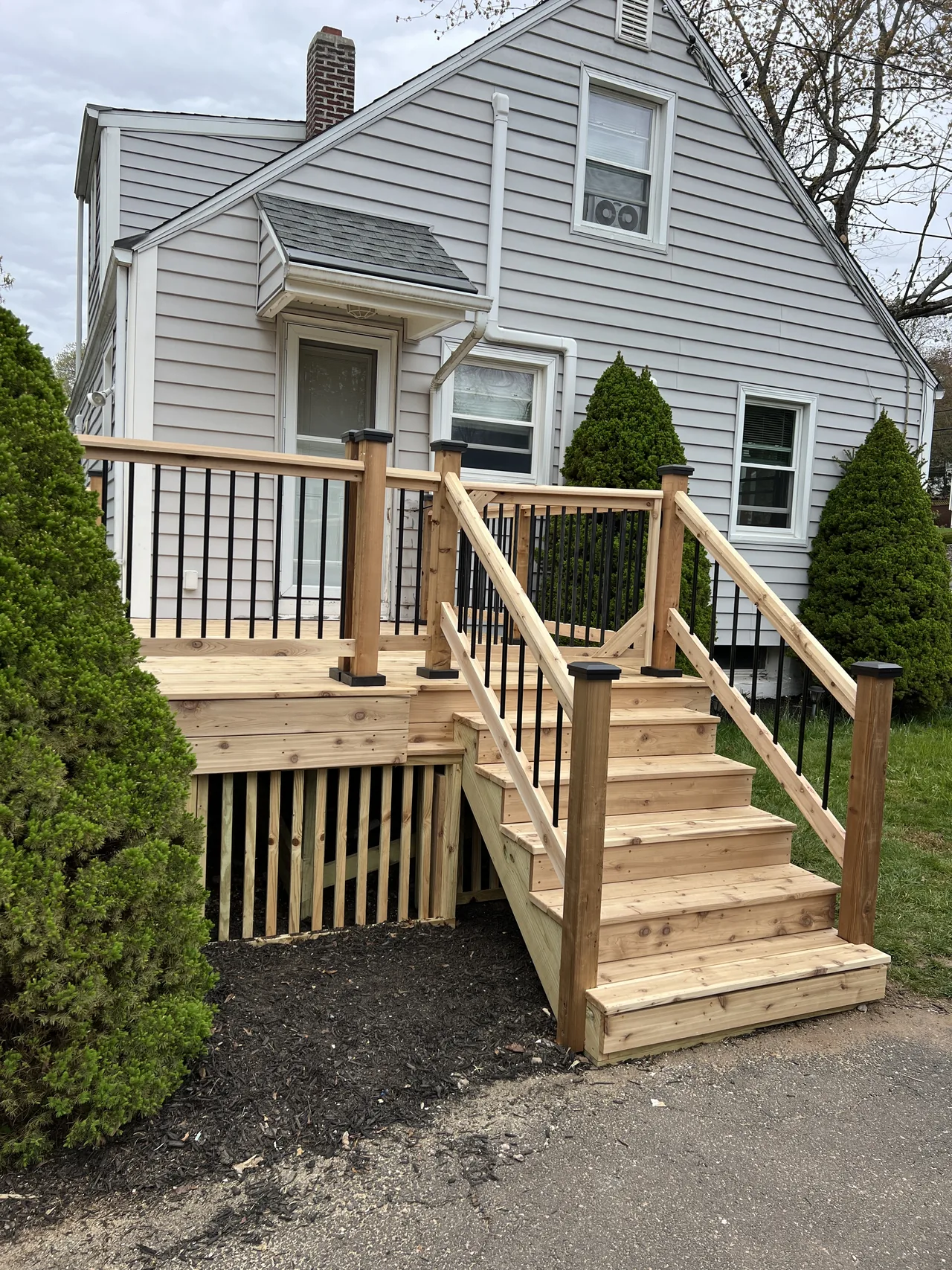 After: completed deck and entrance stairs